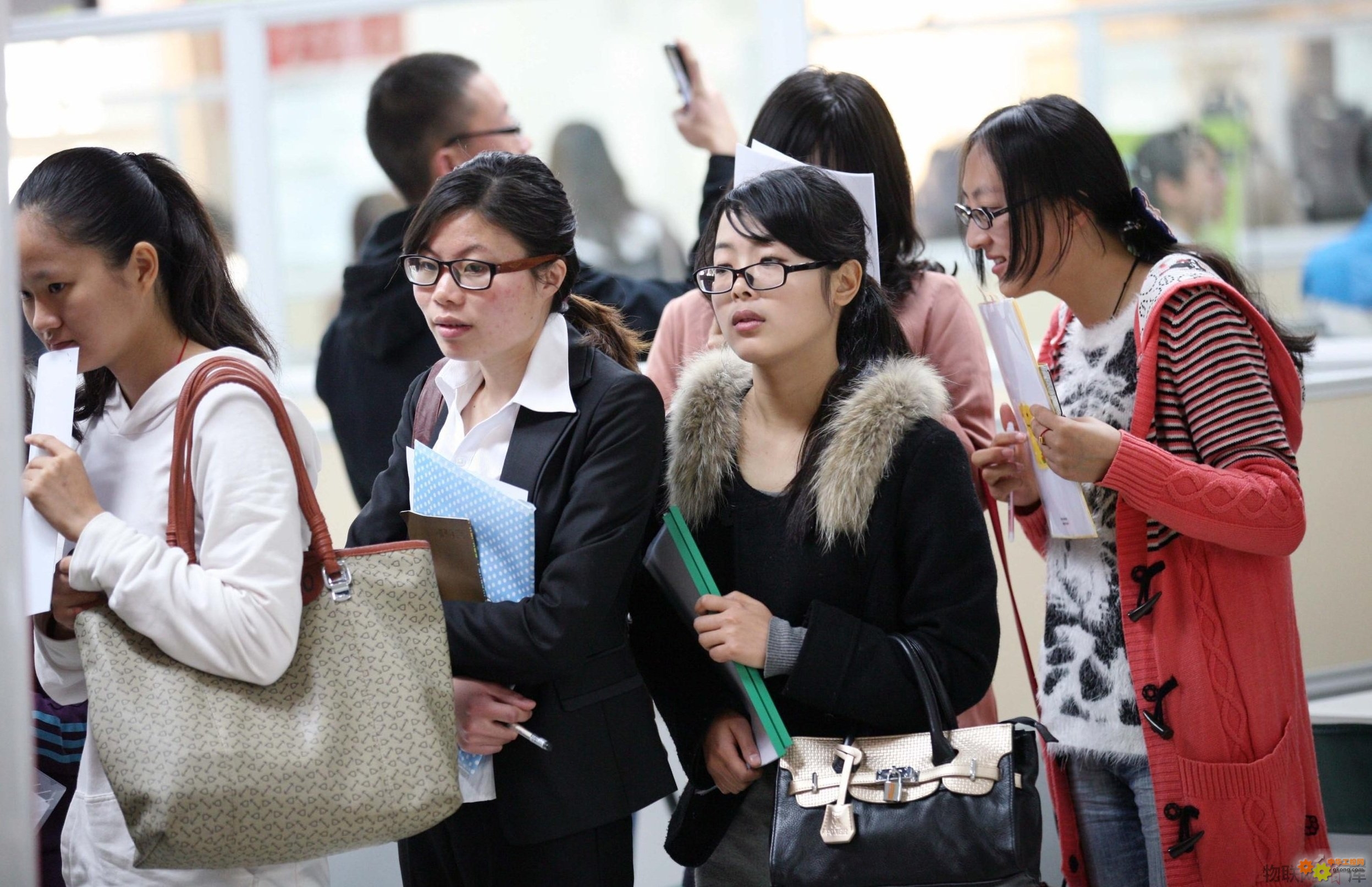 A chinese firm gives loans to female students in exchange
